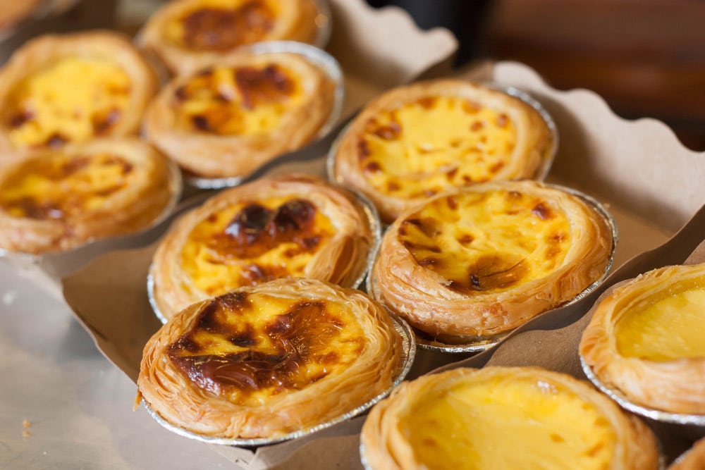 Egg tart or Portuguese egg tart on recycled paper