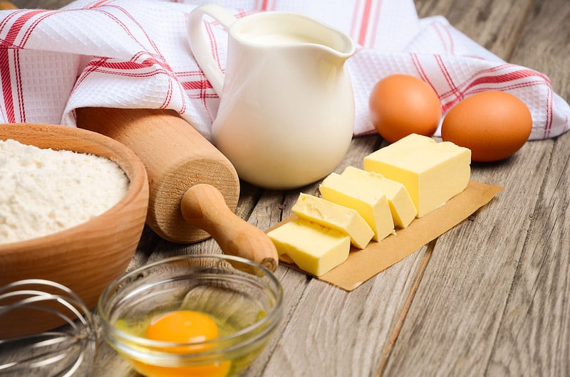 Ingredients for baking - milk, butter, eggs and flour