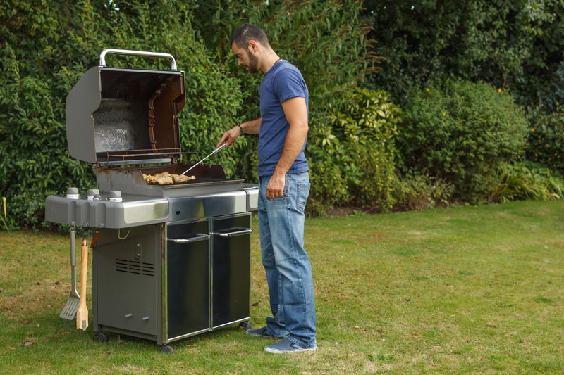 Man at a barbecue grill