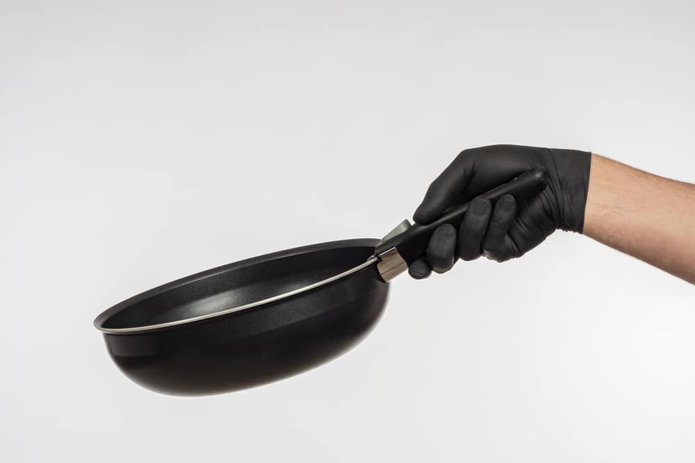 Small frying pan in hand