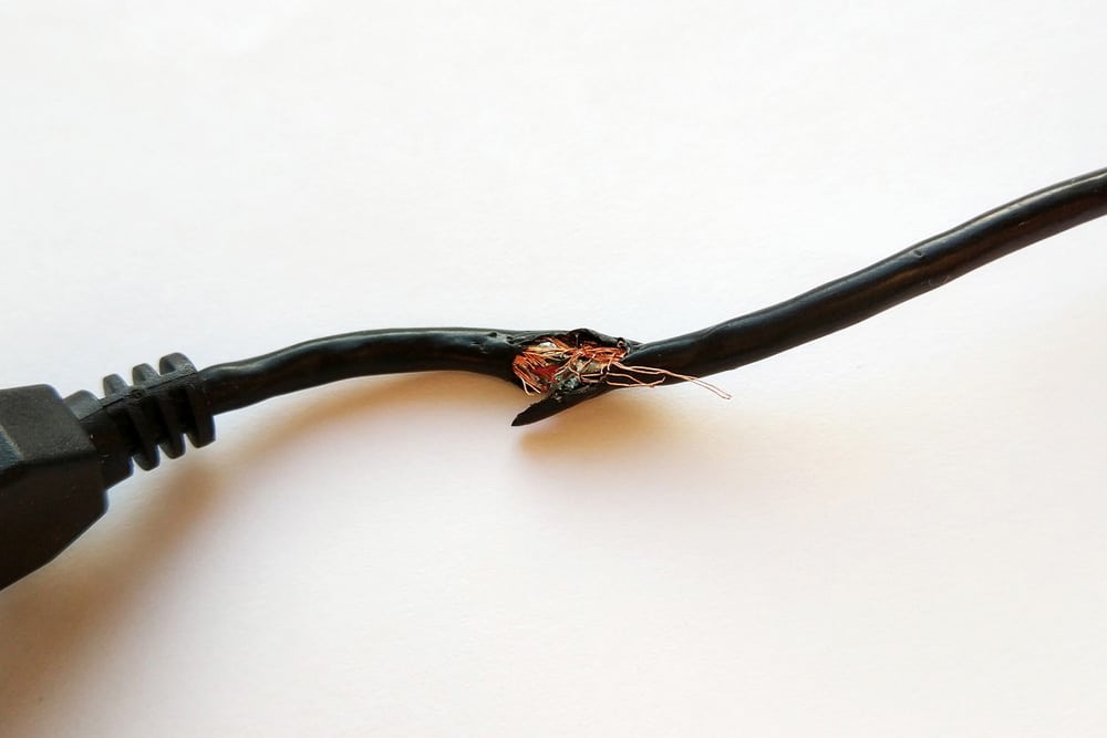 Dangerous broken power electrical cable