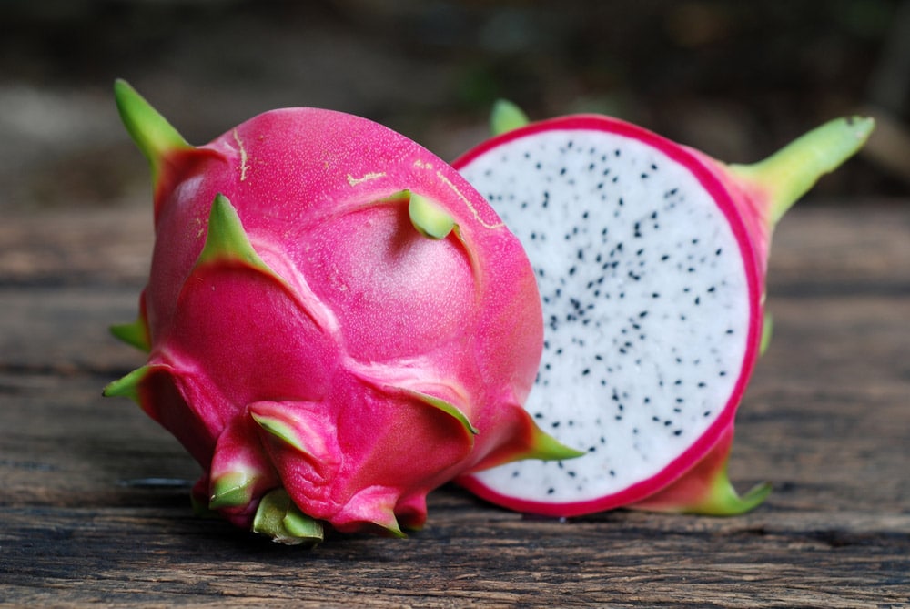 Dragon Fruit On old Wooden Table