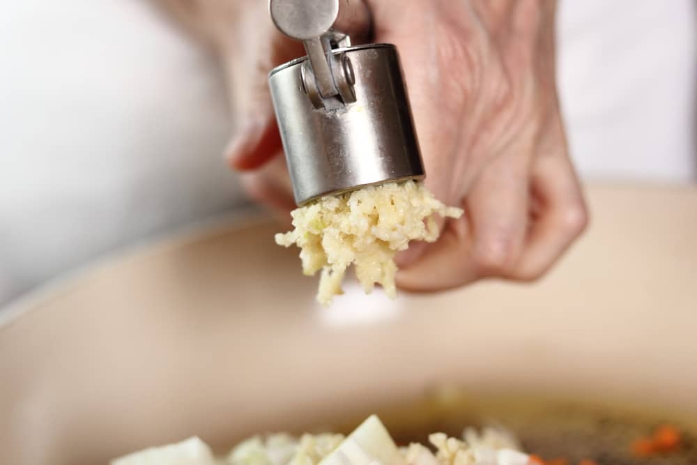 Garlic crushed using a garlic press