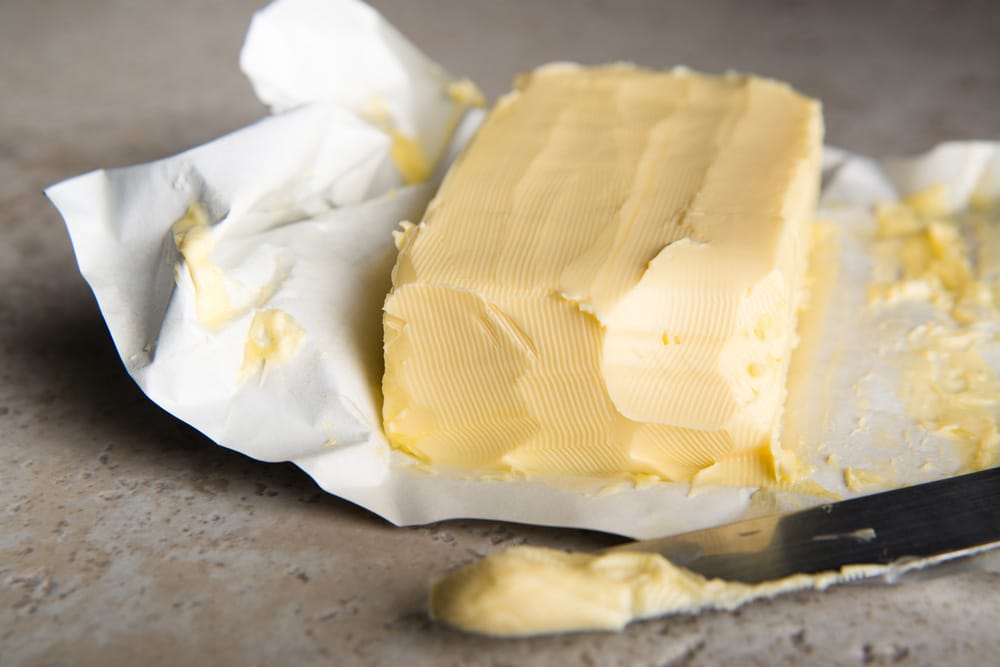 Large Softened Stick of Butter on Wrapping