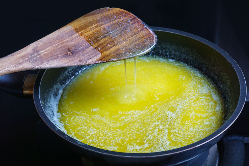 butter melting on non-stick frying pan