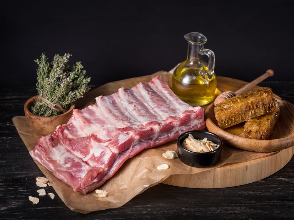 Raw beef ribs with ingredients for marinade honey sauce