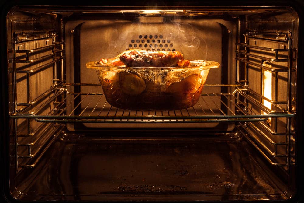 Roast chicken in the oven cooking in the oven