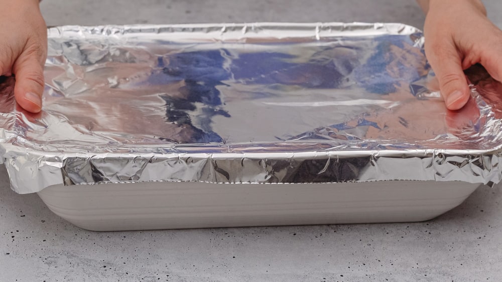 Baking dish covered with aluminum foil