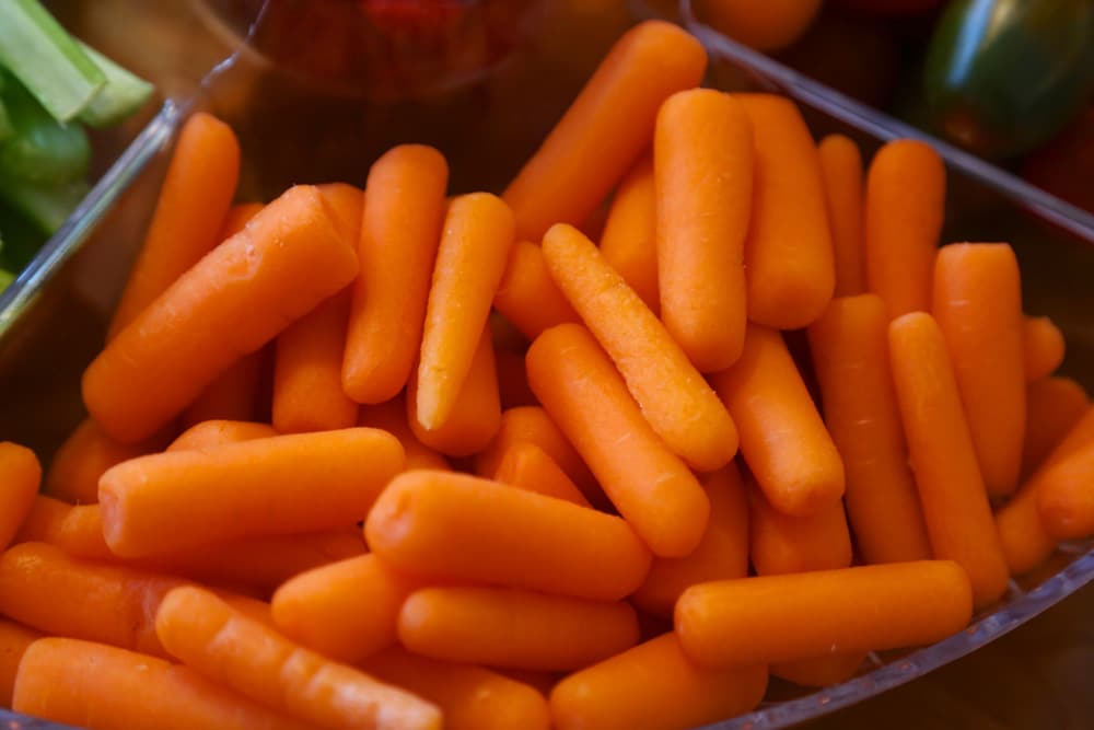 A Bowl of chopped carrots in a dish