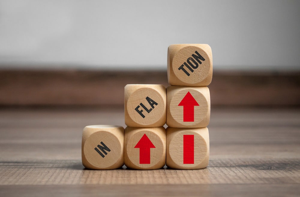 Blocks with inflation on wooden background