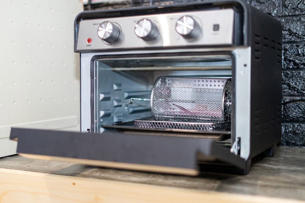 Electric oven cage or rotating basket inside air fryer oven