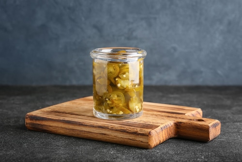 Glass jar with canned jalapeno