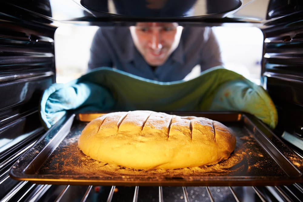 Man Bread Into Oven To Bake