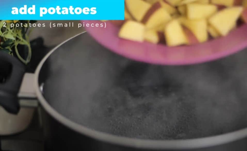 adding potatoes