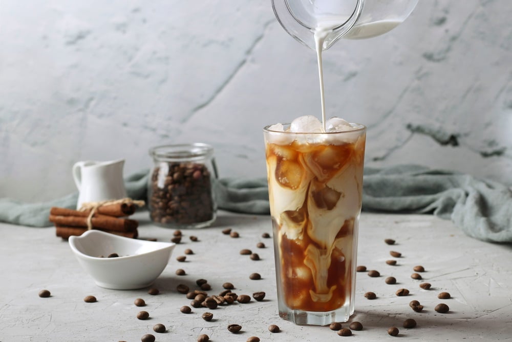 iced coffee milk cream pouring