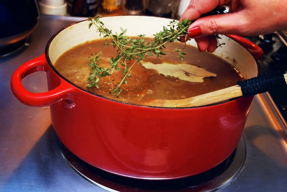 cooking sprig of thyme in dutch oven