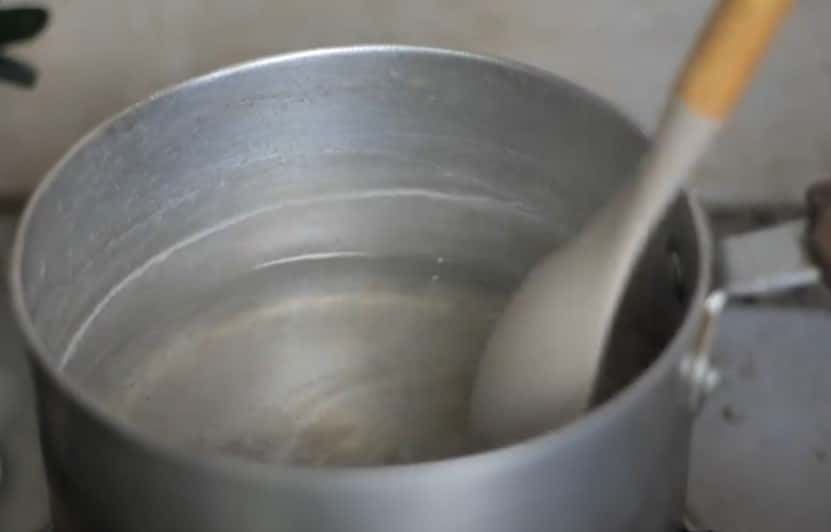 mixing sugar in water