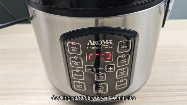 AROMA cooker display showing cooking started AROMA cooker display showing cooking started
