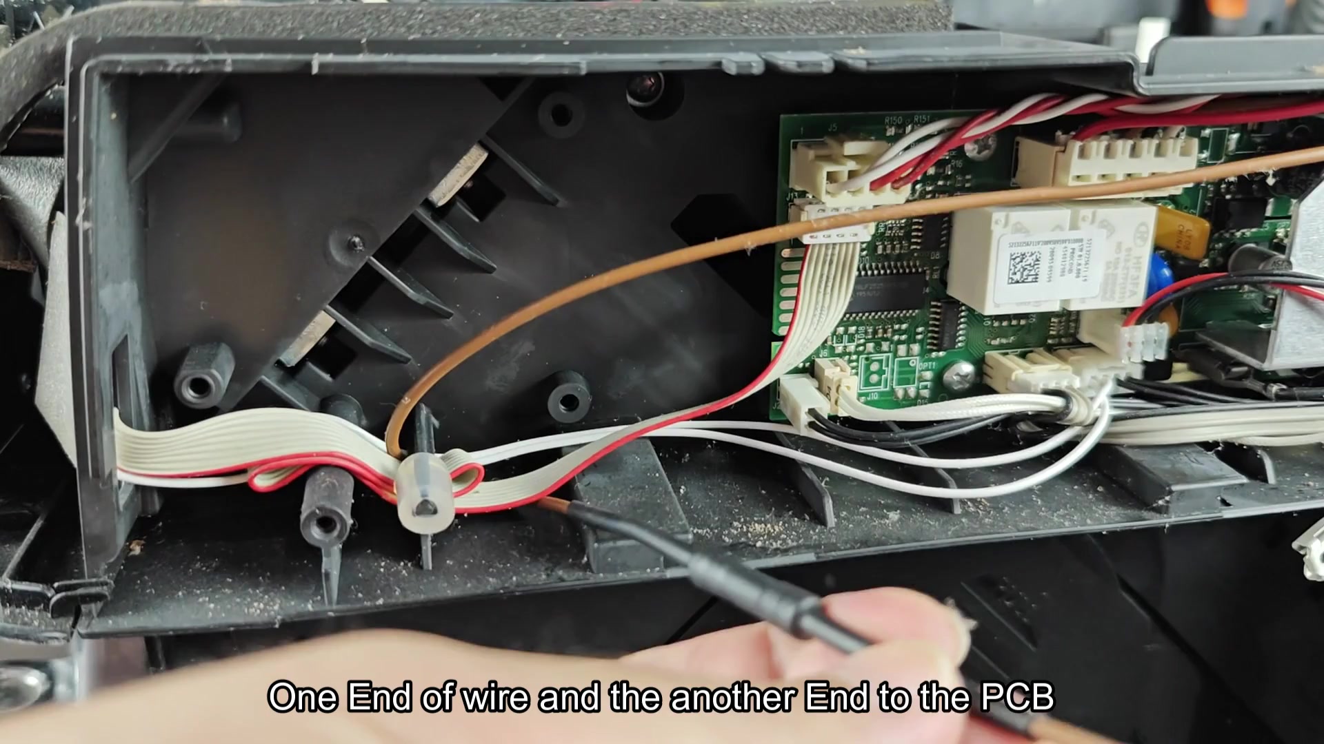 Brown wire routed to green circuit board Brown wire routed to green circuit board