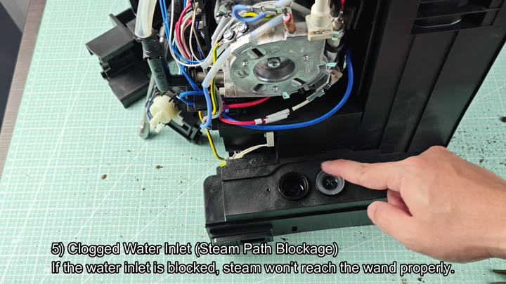 Clogged water inlet on base Clogged water inlet on base