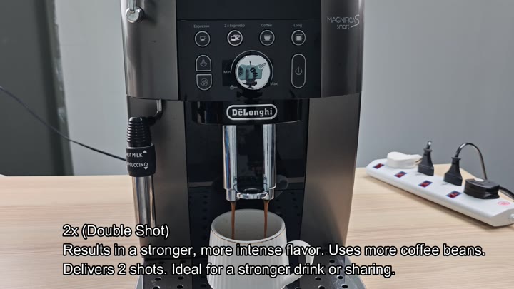 Coffee dispensing into white cup from Magnifica Coffee dispensing into white cup from Magnifica
