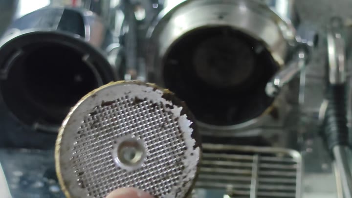 Dirty metal mesh filter with residue Dirty metal mesh filter with residue