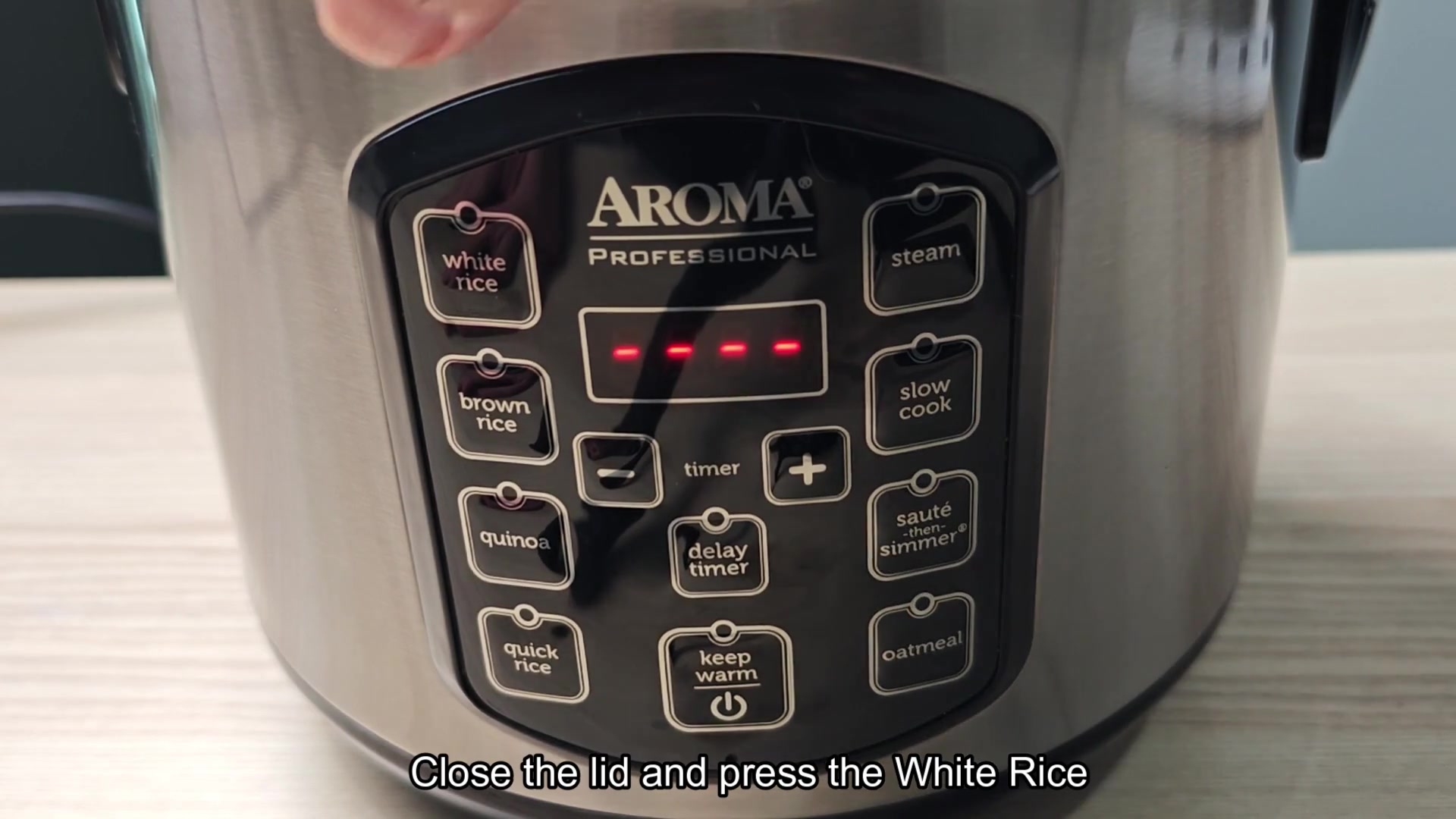 Display shows cooking started for rice Display shows cooking started for rice