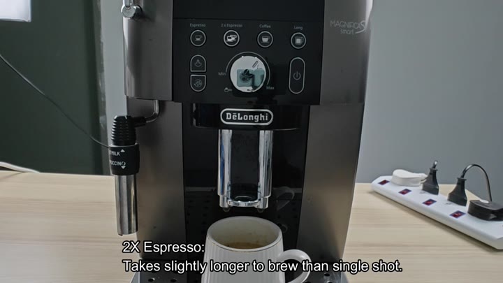 Espresso brewing into ceramic mug Espresso brewing into ceramic mug