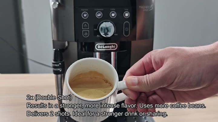 Espresso crema forming in white cup below Espresso crema forming in white cup below