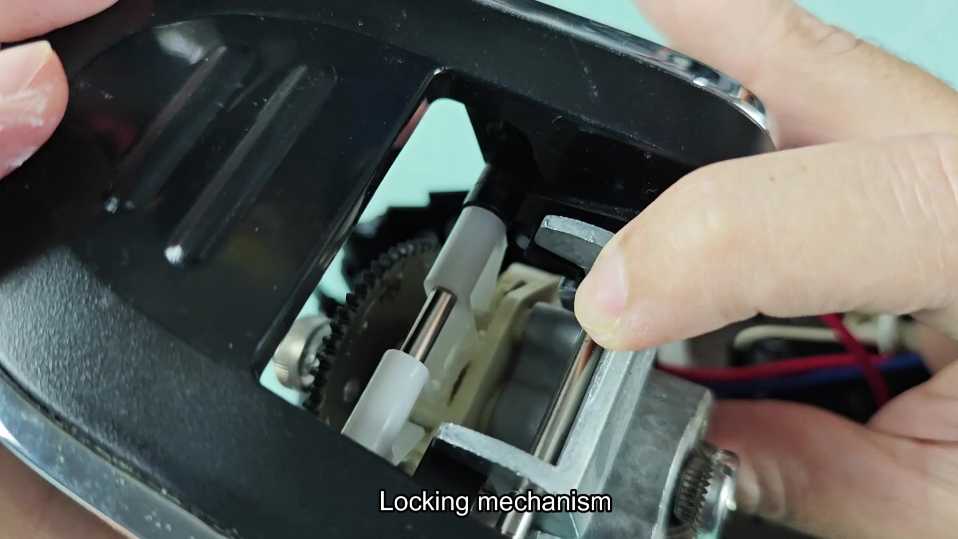 Examining locking mechanism slider area Examining locking mechanism slider area