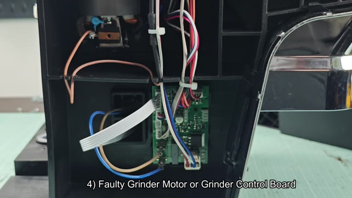 Exposed grinder motor and control board Exposed grinder motor and control board
