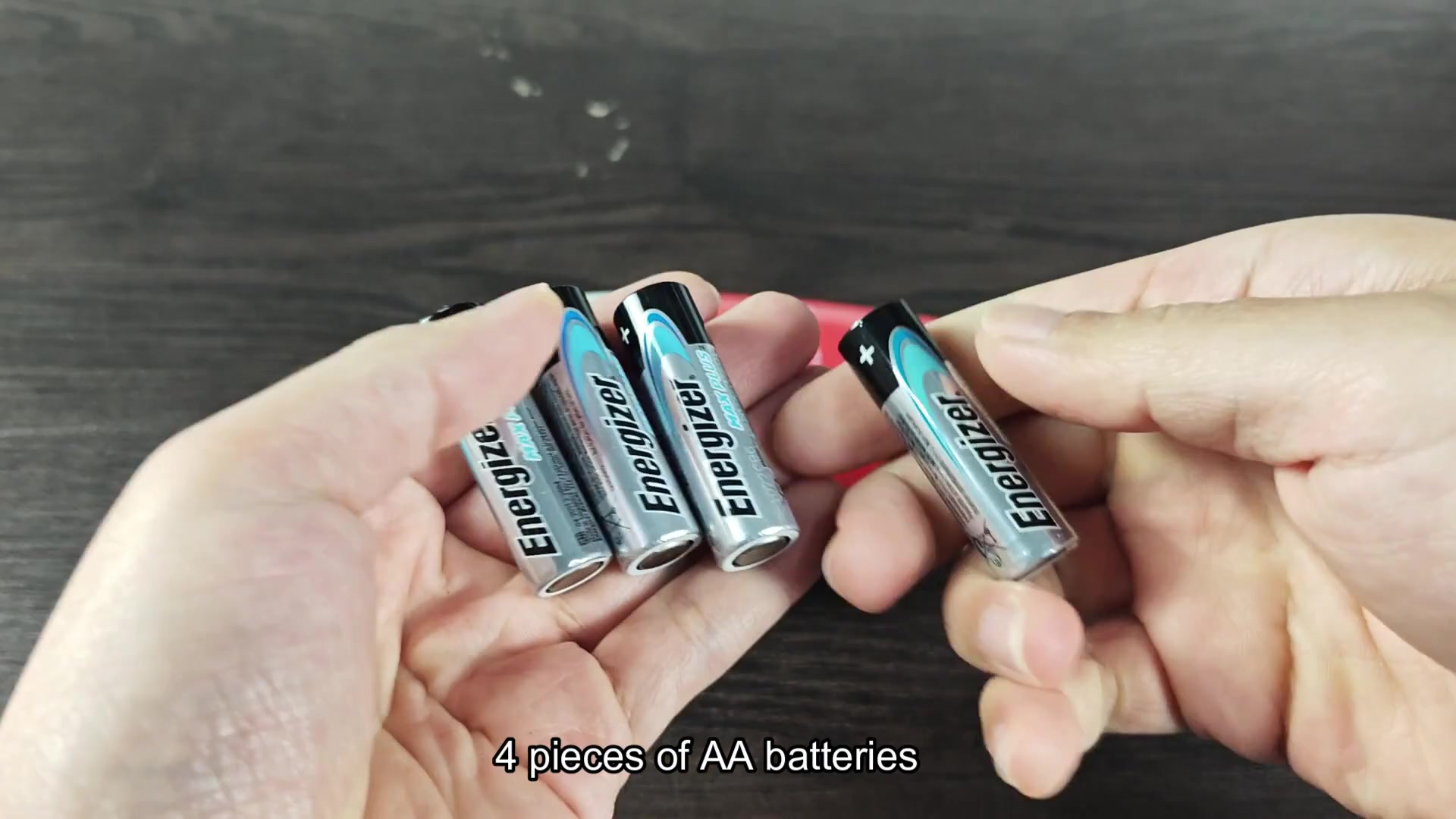 Four Energizer AA batteries displayed Four Energizer AA batteries displayed