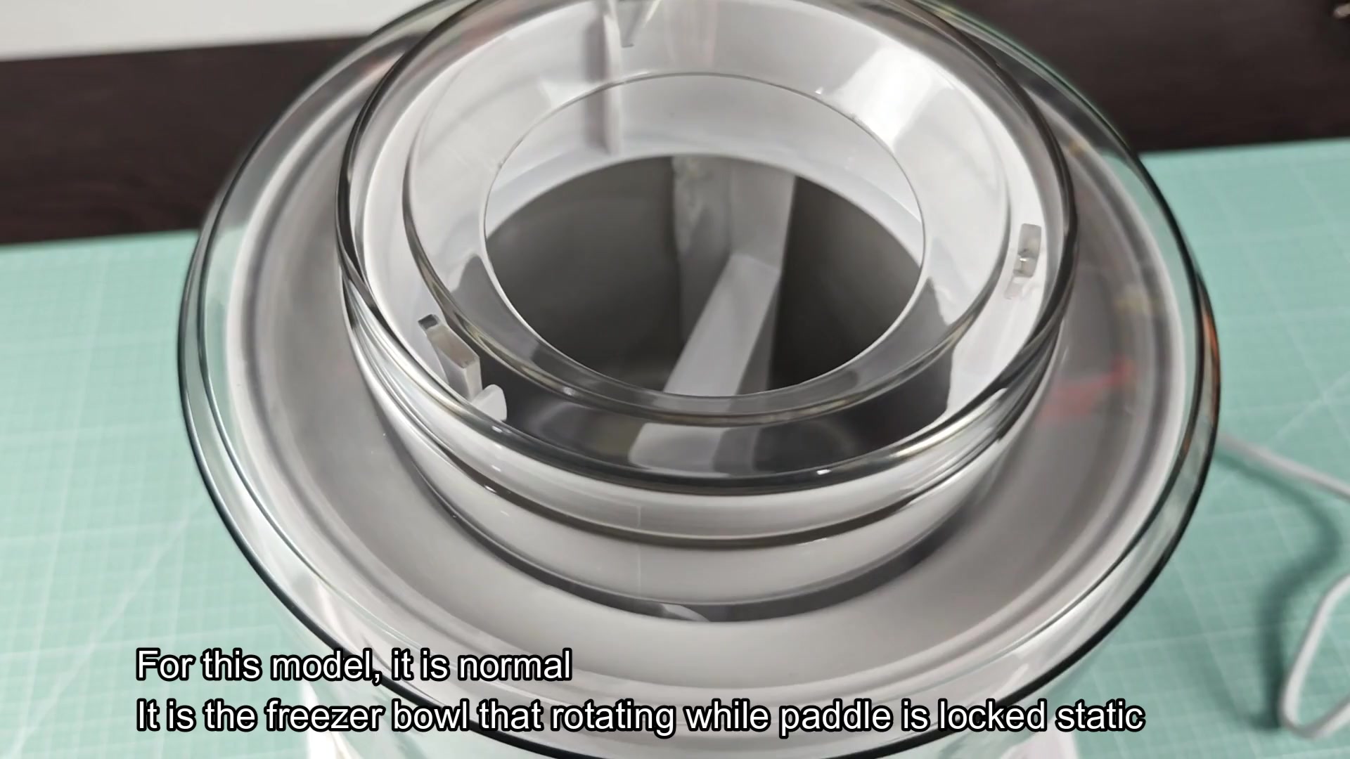Freezer bowl rotates while paddle stays static Freezer bowl rotates while paddle stays static