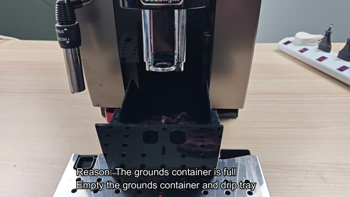 Full grounds container in DeLonghi machine Full grounds container in DeLonghi machine