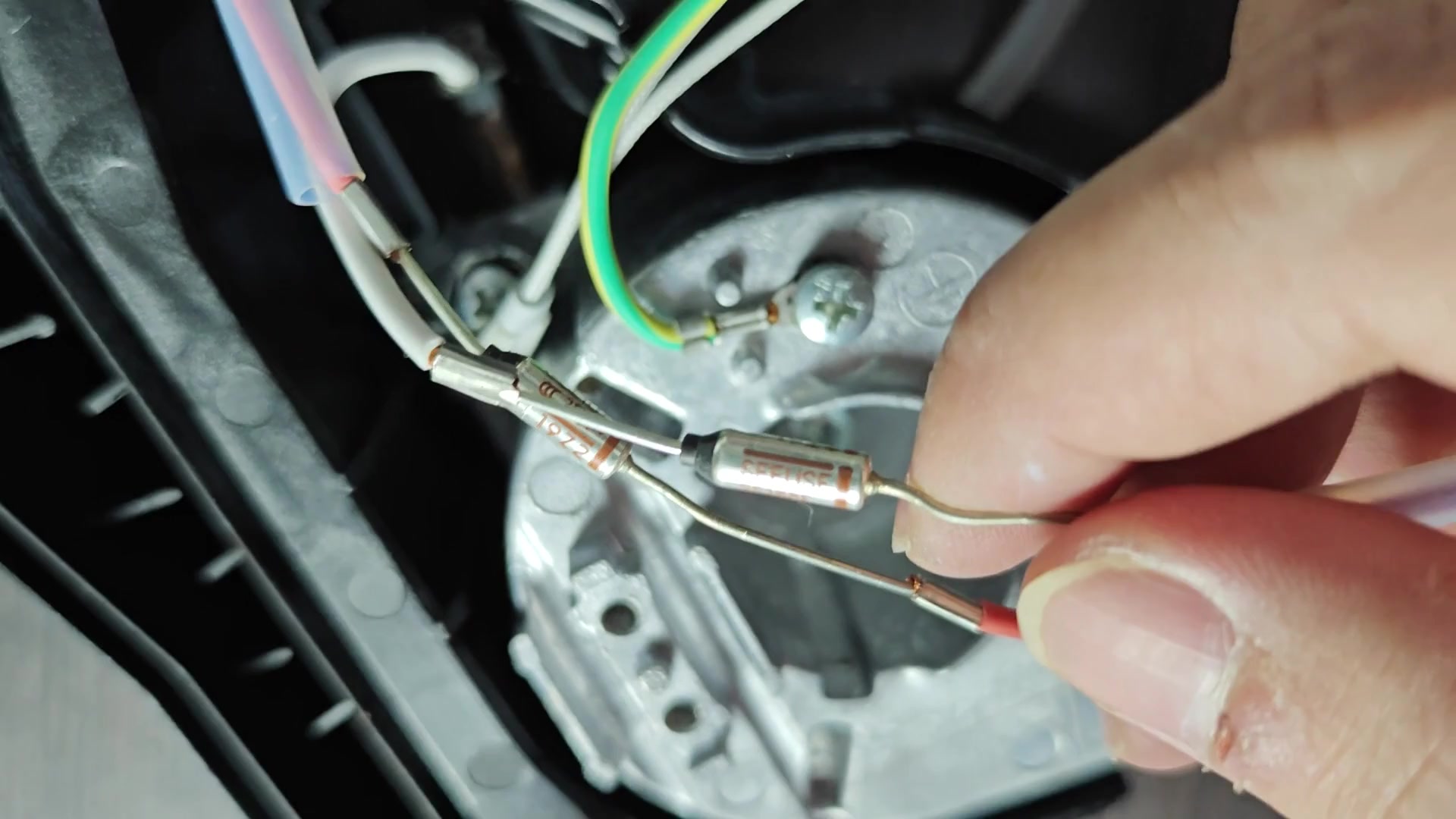 Heater unit labeled 2000W 240V specs Heater unit labeled 2000W 240V specs