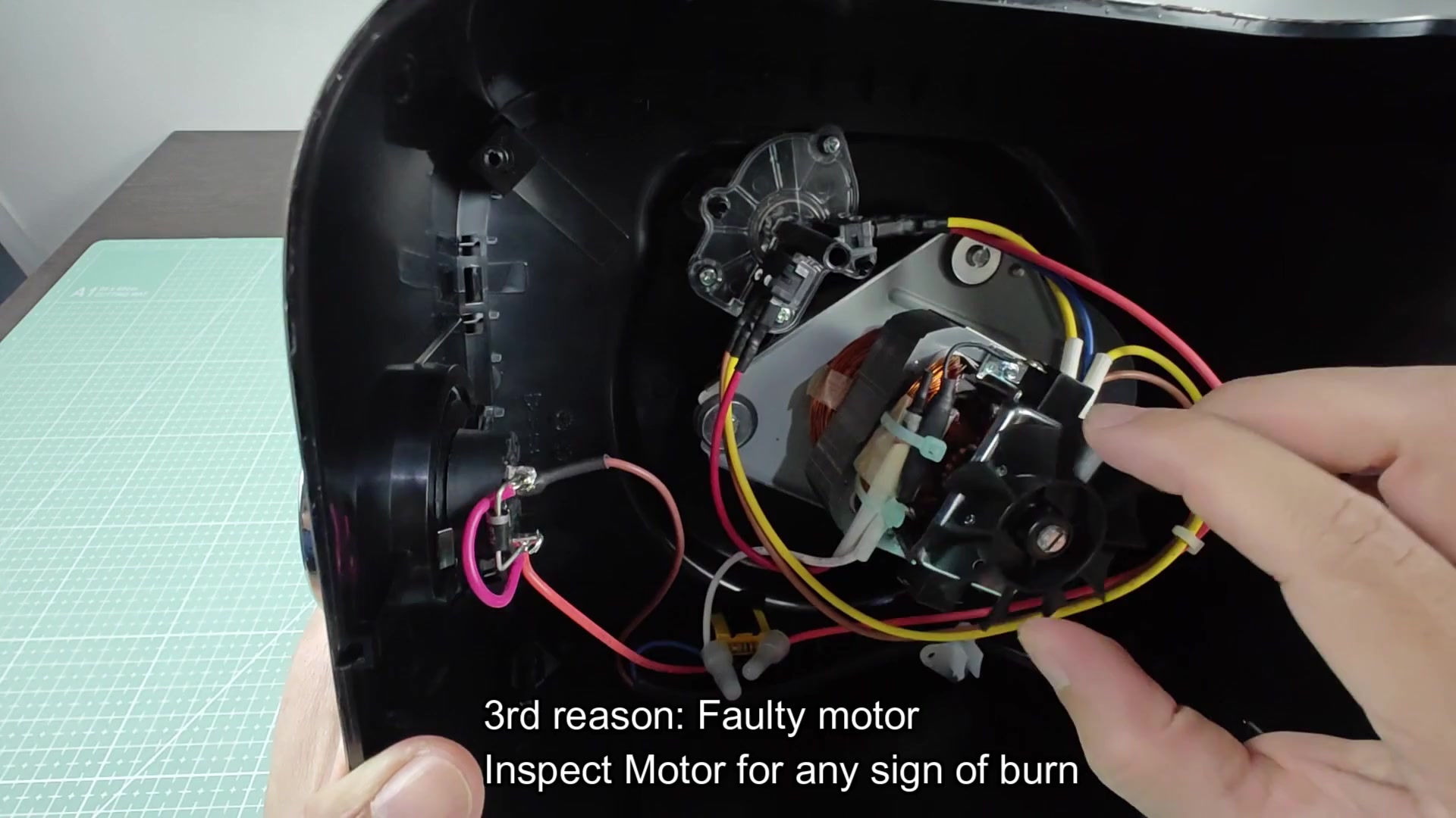 Inspecting fan wheel for damage Inspecting fan wheel for damage