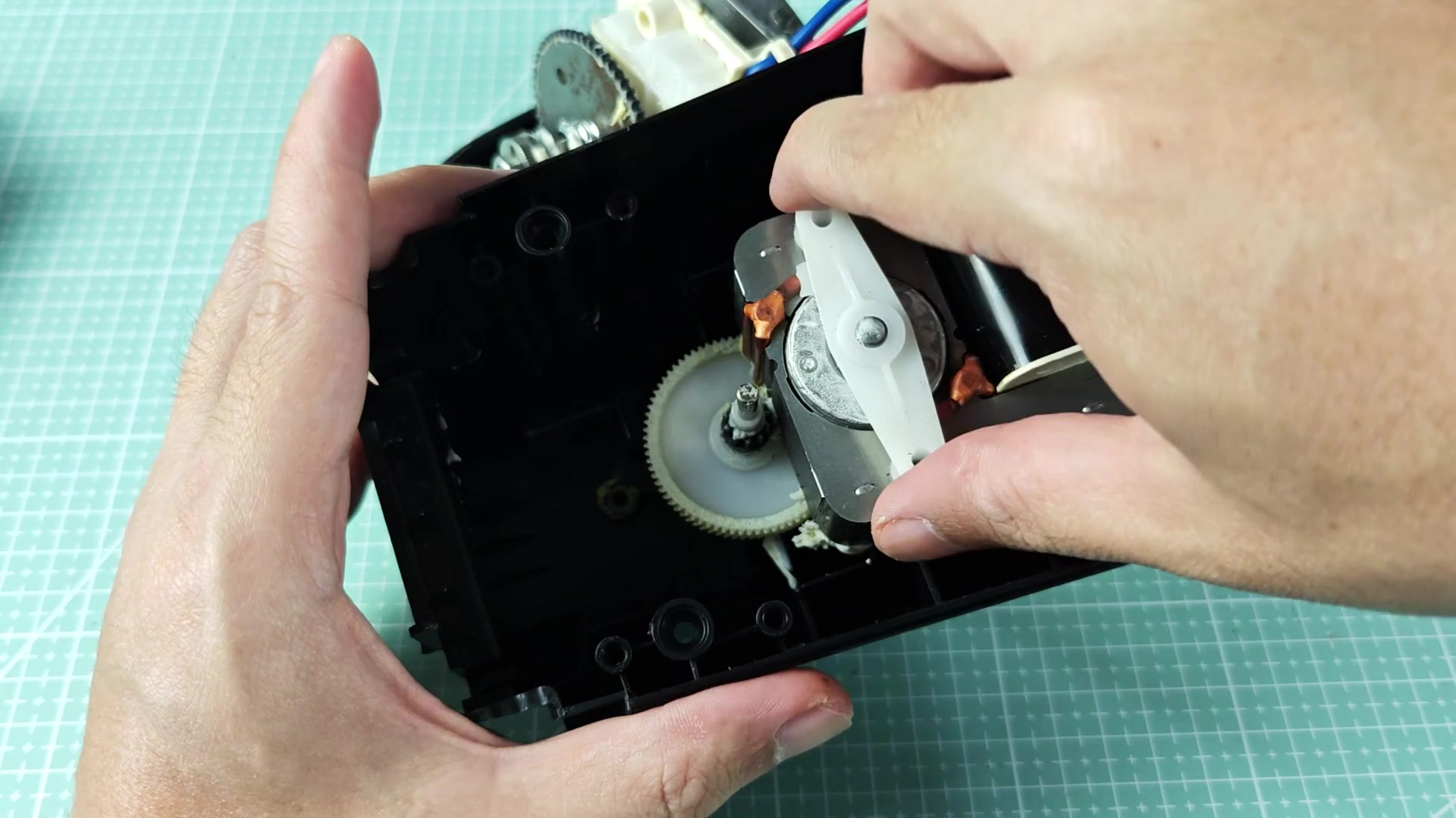 Inspecting faulty Euroka motor component Inspecting faulty Euroka motor component