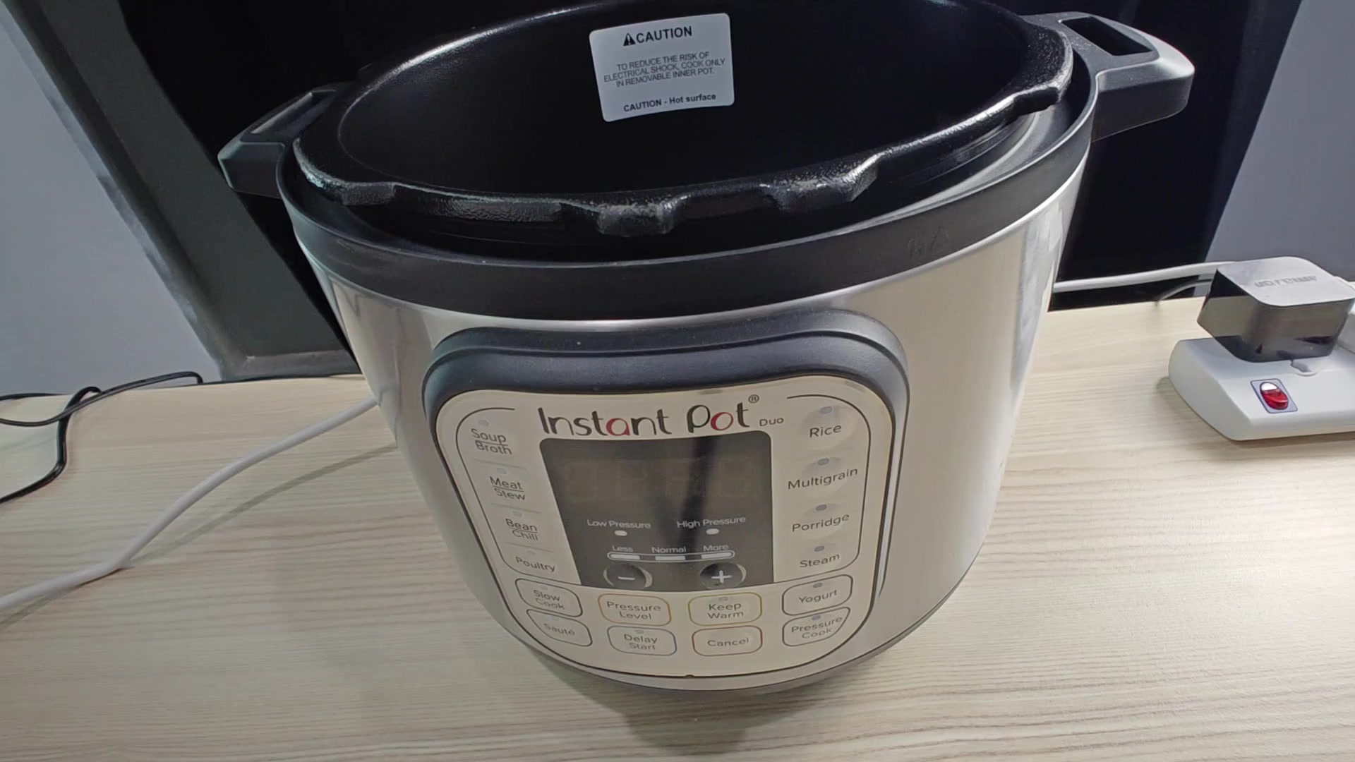 Instant Pot control panel on desk Instant Pot control panel on desk