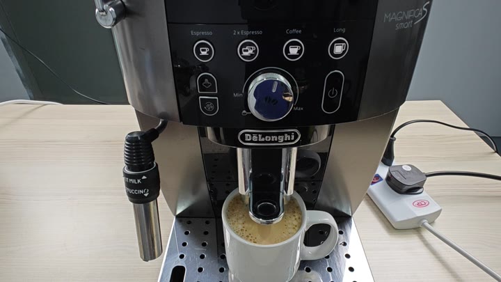 Magnifica S Smart machine dispensing coffee Magnifica S Smart machine dispensing coffee
