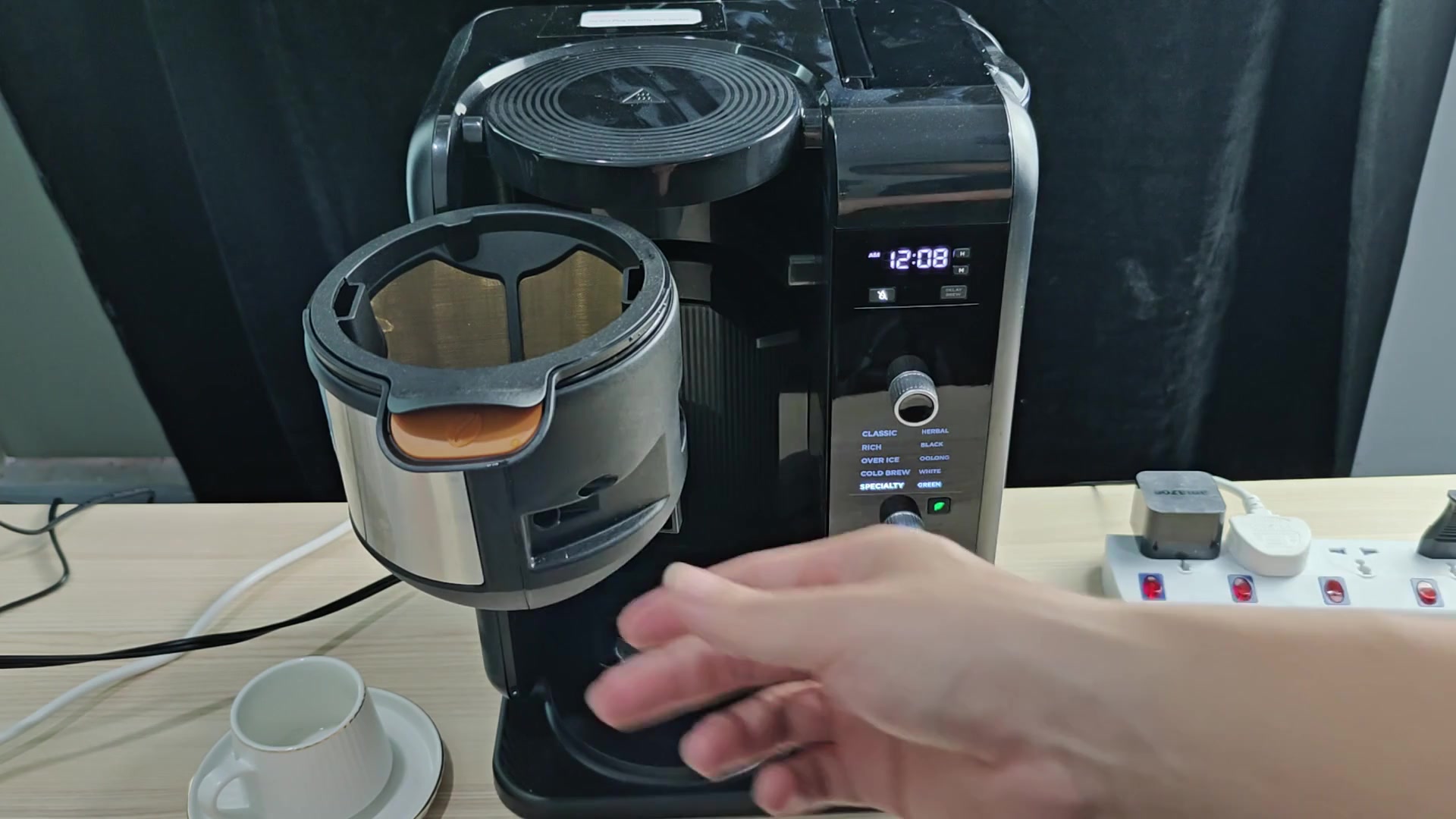 Metal filter holder with brewed coffee Metal filter holder with brewed coffee