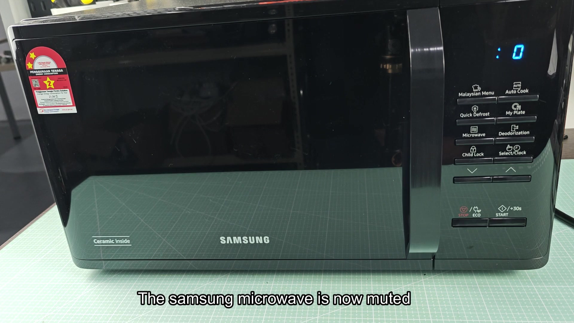 Microwave display confirms sound is muted Microwave display confirms sound is muted