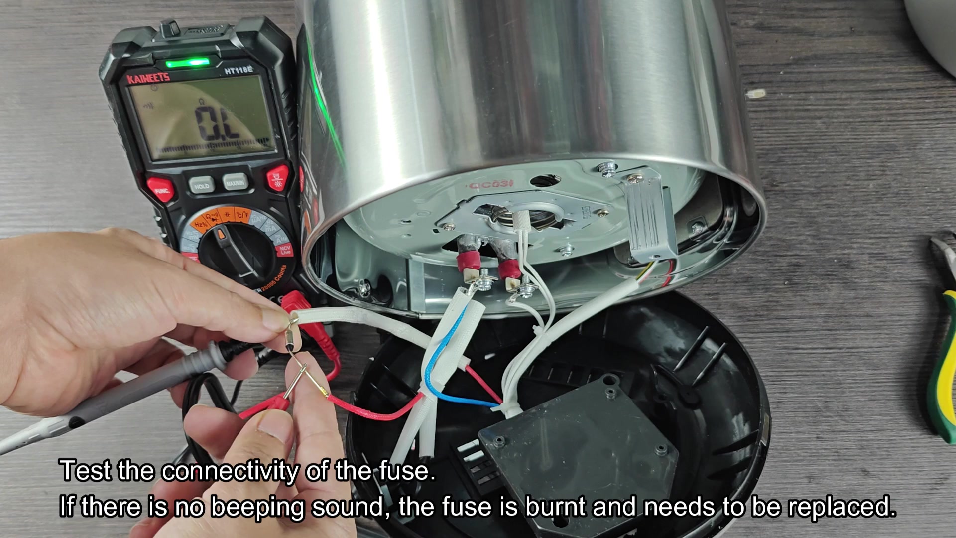 Multimeter checking fuse circuit continuity Multimeter checking fuse circuit continuity
