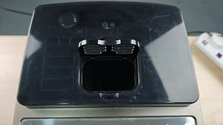 Open coffee machine funnel compartment Open coffee machine funnel compartment