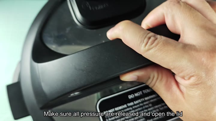 Opening lid after pressure release Opening lid after pressure release