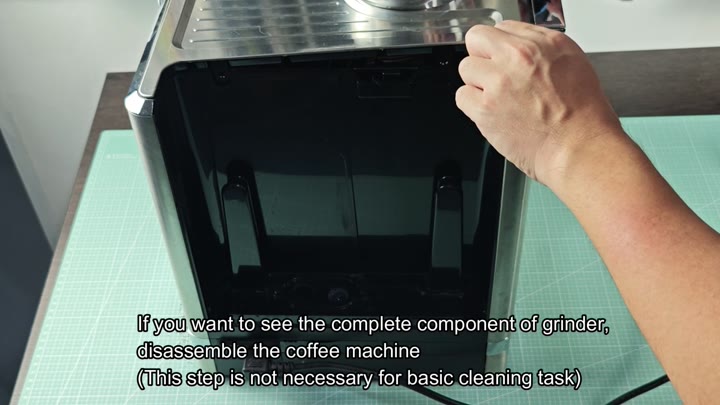 Opening panel to reveal internal grinder parts Opening panel to reveal internal grinder parts