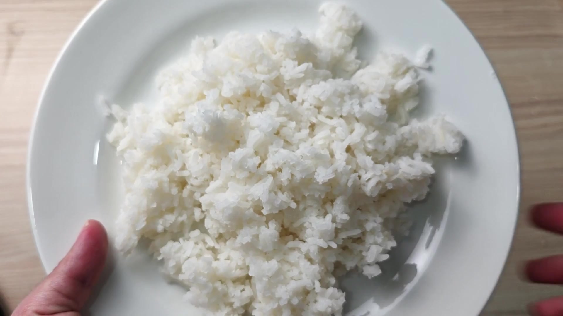 Plate of cooked white rice portion Plate of cooked white rice portion