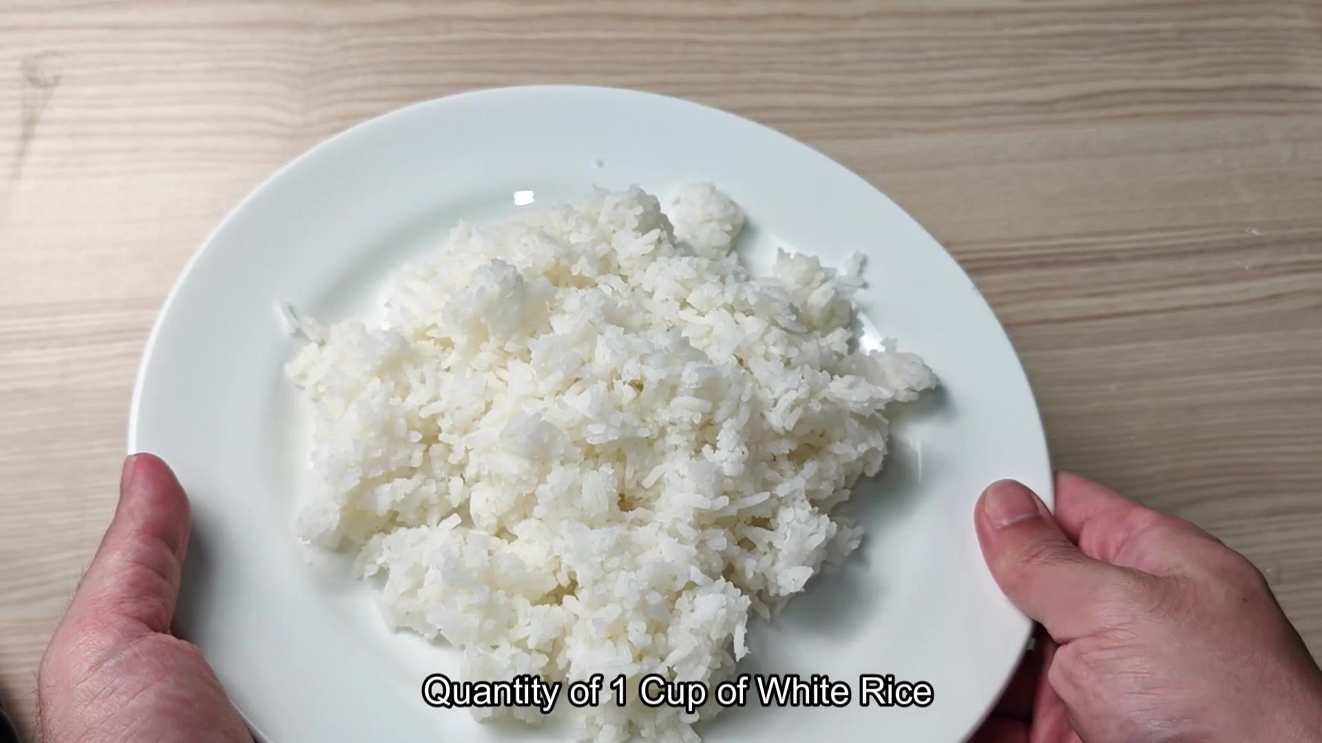 Plated serving of fluffy rice Plated serving of fluffy rice