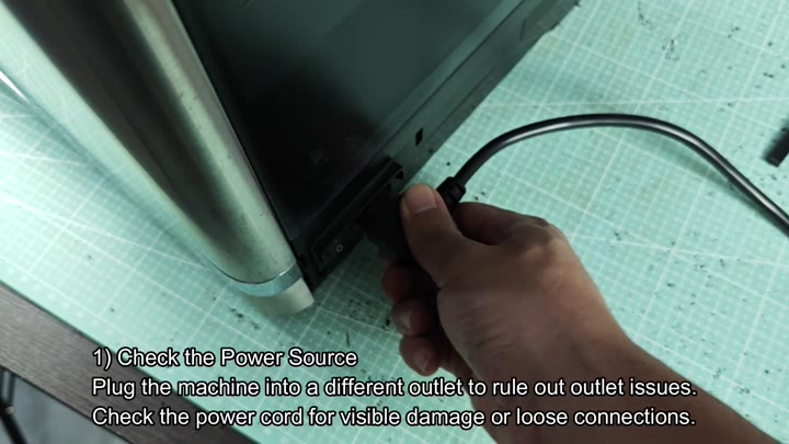 Plugging DeLonghi into power outlet Plugging DeLonghi into power outlet