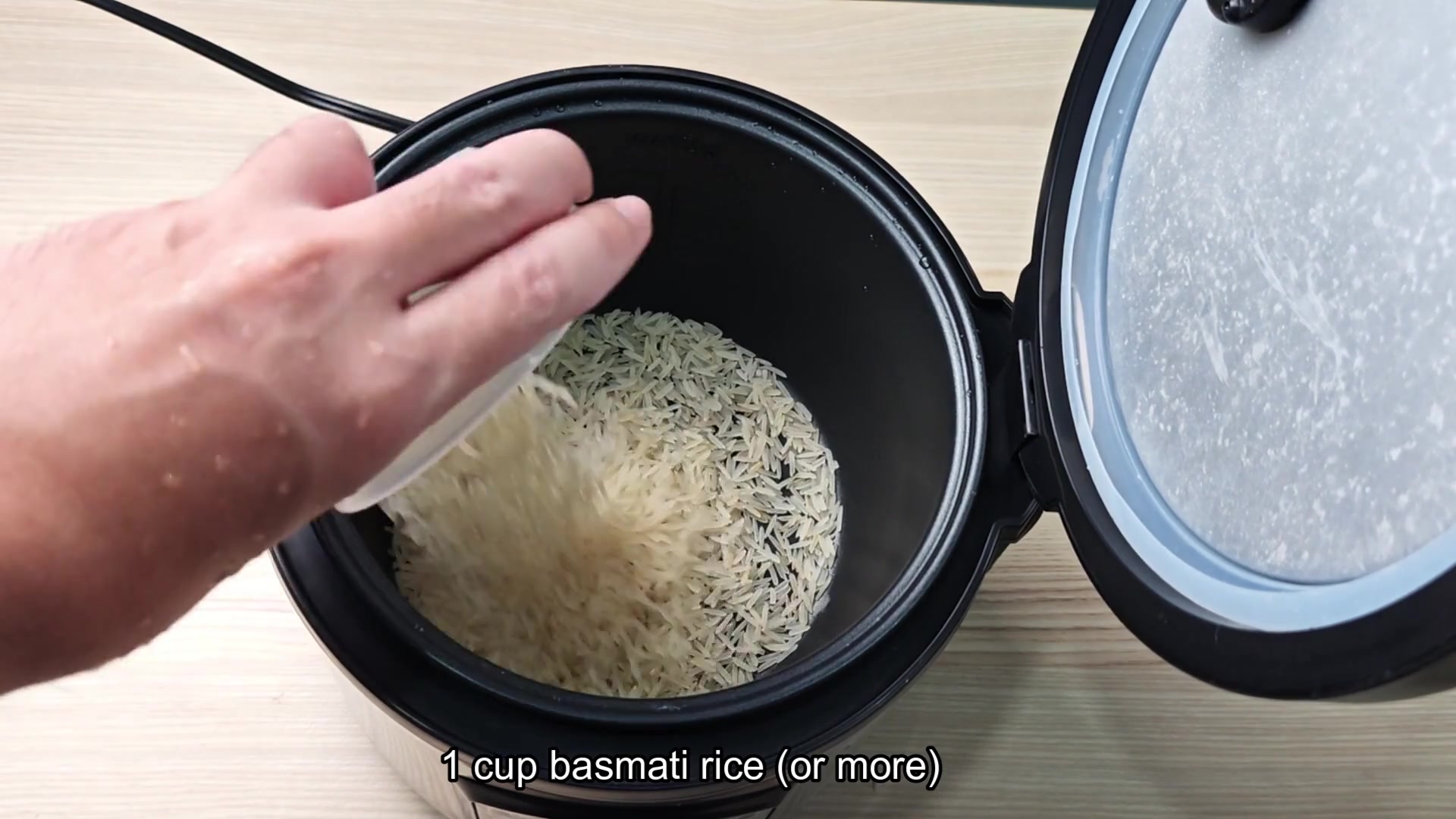 Pouring one cup of basmati rice Pouring one cup of basmati rice
