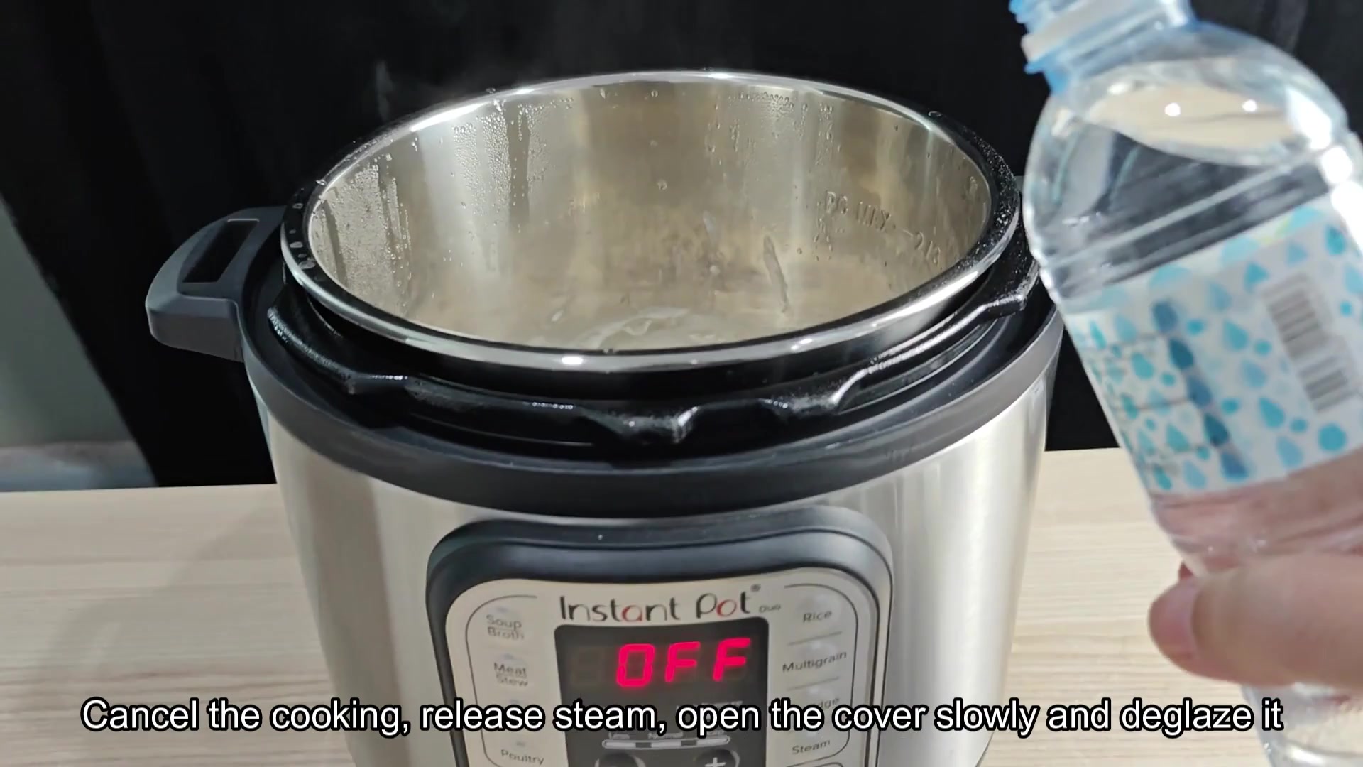 Pouring water into Instant Pot inner pot Pouring water into Instant Pot inner pot